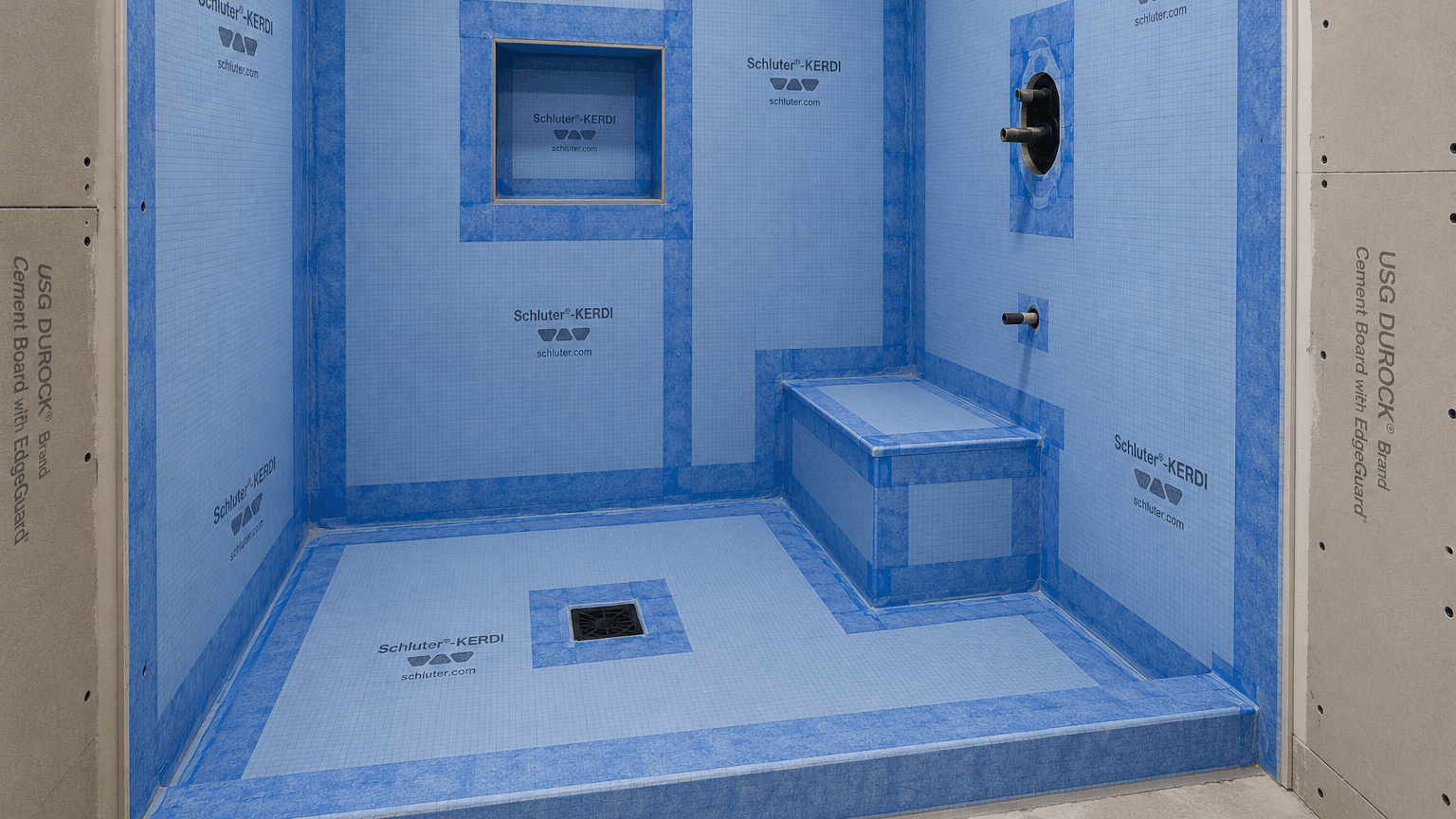Shower waterproofing membrane installation covering walls, floor, niche, bench, corners and drain before tile