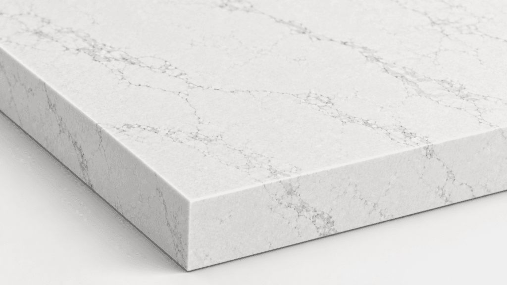 White quartz countertop slab corner with subtle gray veining